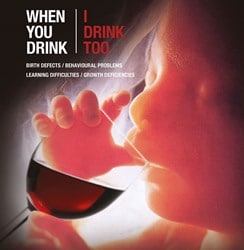 scan of foetus and glass of wine
