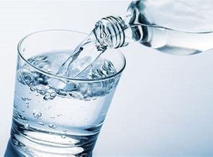 Fresh water being poured into a glass