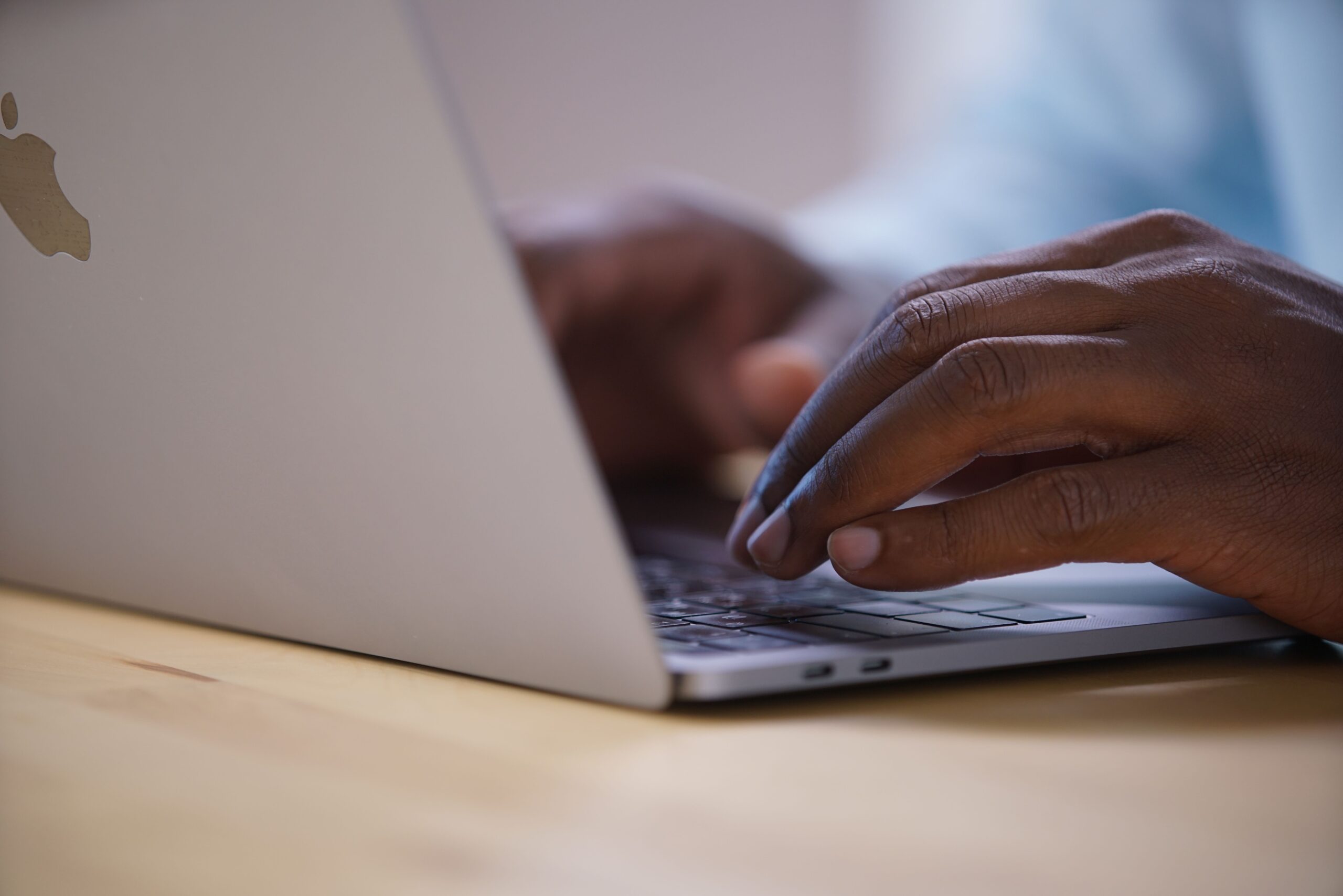 Two hands typing on a laptop – Step By Step Recovery